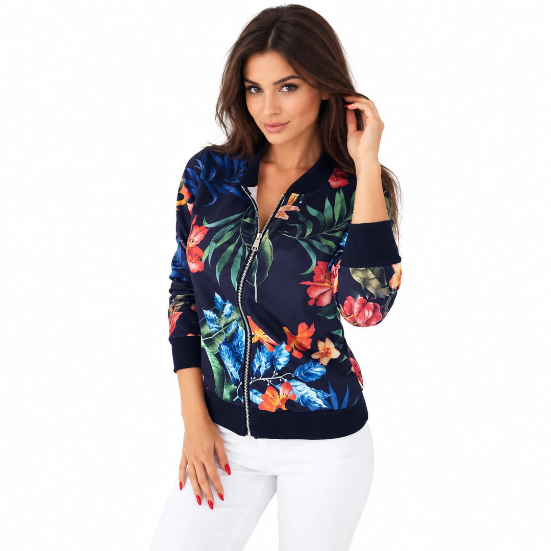 Dark Blue floral zip jacket on a model against a white studio background showing the botanical print, zipper and ribbed trim.