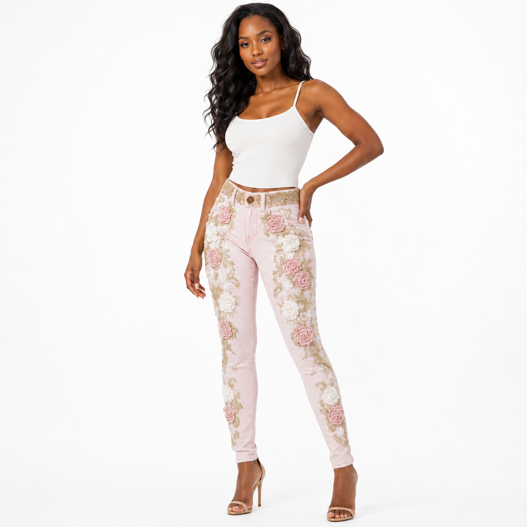 Pink floral embroidered jeans highlighting rose appliques and slim silhouette on Black woman model