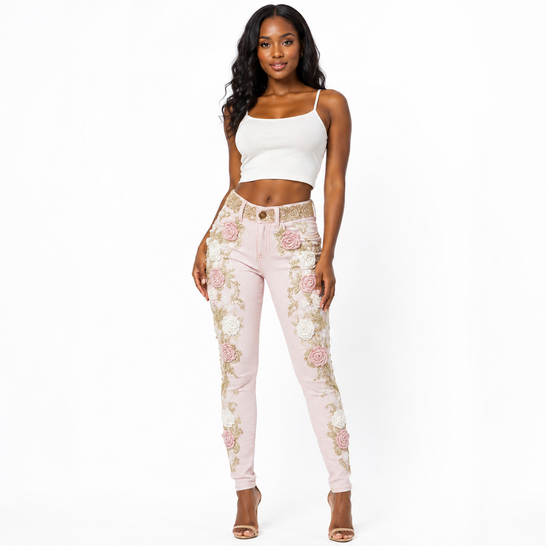 Pink floral embroidered jeans with rose appliques and gold detailing - front view on Black woman model