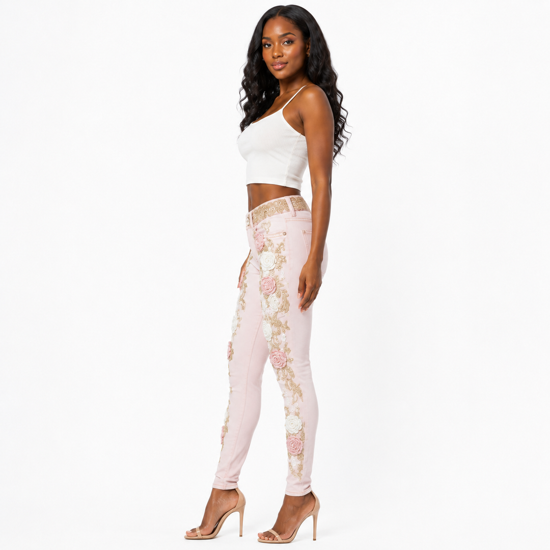 Pink floral embroidered jeans with rose and gold details - side view on Black woman model