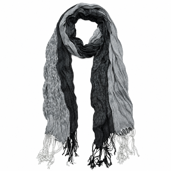 Front product view of the long jacquard wrap with full length and fringe visible.