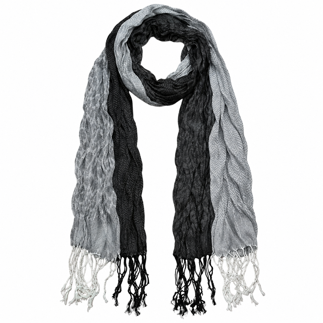 Reverse view of the grey-and-black jacquard wrap showing woven pattern and fringe.