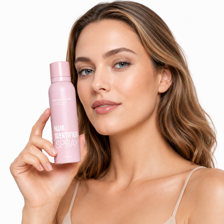 Hair Identifier Spray 100 ml bottle held beside a professional model&