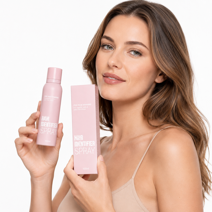 Hair Identifier Spray set with matching pink bottle and box displayed by a professional model in a clean ecommerce beauty image.