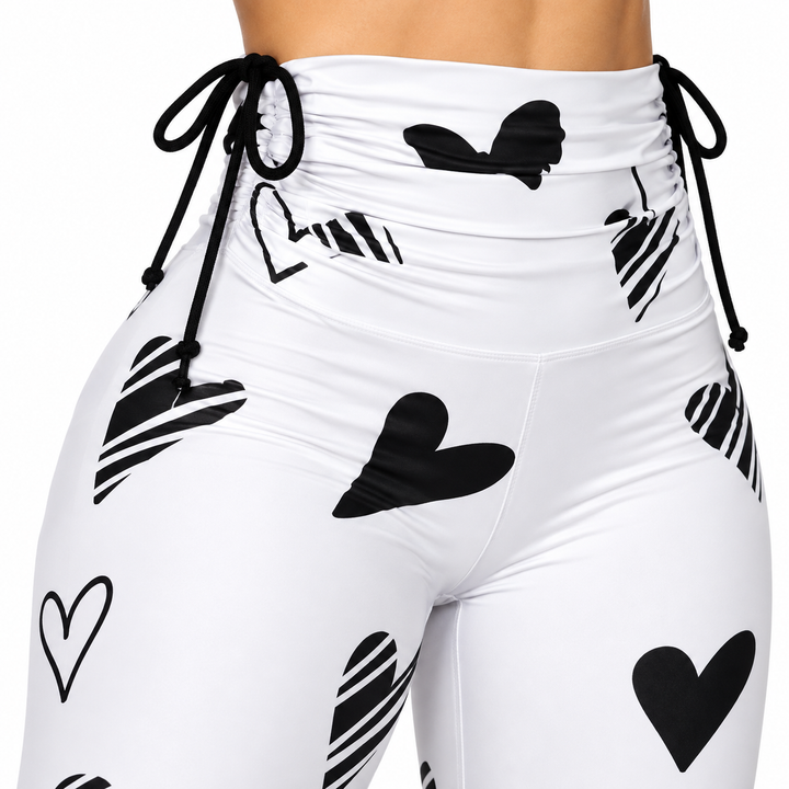 Close-up of gathered waistband with black drawstring ties