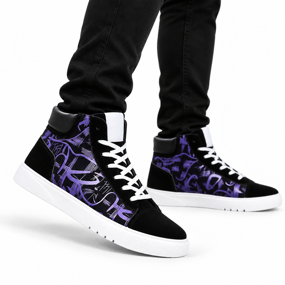 Purple graphic high top sneakers worn by a male model in black pants on a white background