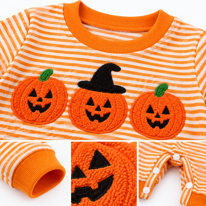 Close-up of pumpkin graphic, striped fabric, cuff and snap details