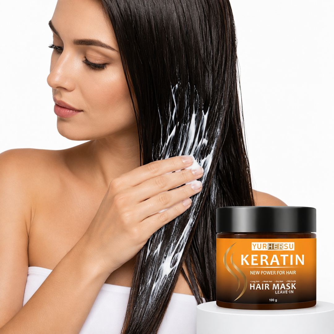 Keratin leave-in hair mask applied through long wet hair on a clean white studio background
