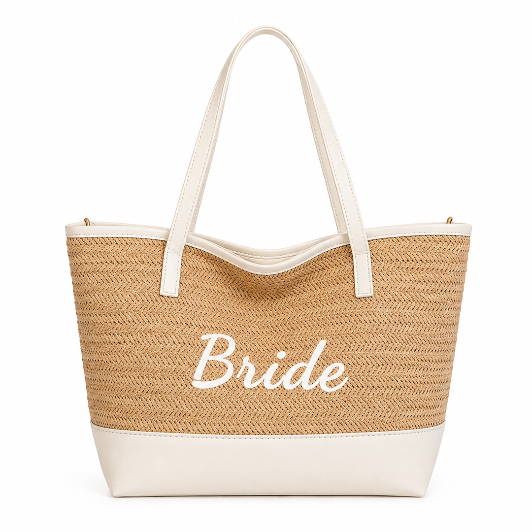 Front view of Bride woven seaside tote bag with light khaki woven body, white trim, white base and long handles