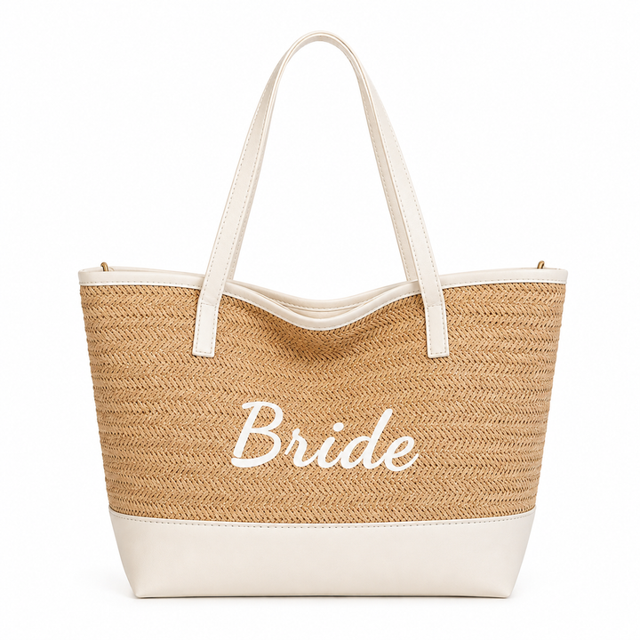 Front view of Bride woven seaside tote bag with light khaki woven body, white trim, white base and long handles
