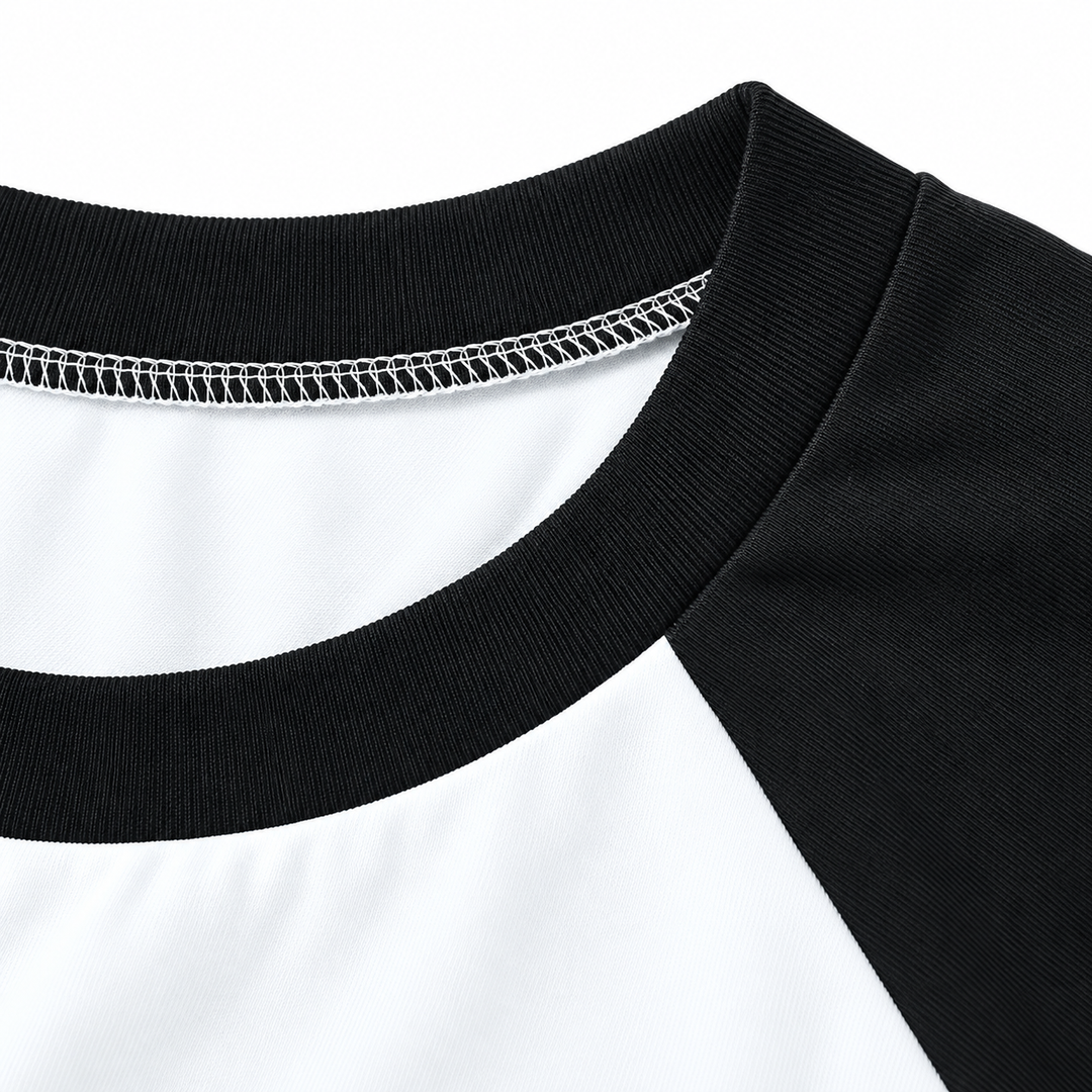 Black crew neckline and raglan seam detail on the white tee