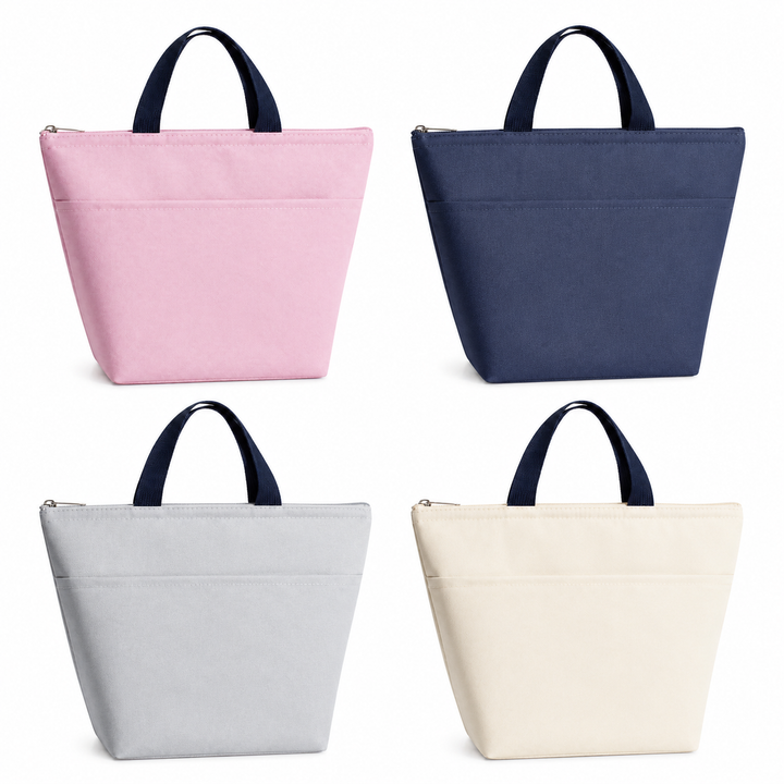 Four lunch tote color variants on white - soft pink, navy blue, light gray and beige - with matching dark navy handles detail