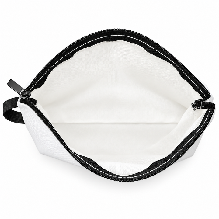 Top view of makeup bag opened to show the plain light interior and black zipper