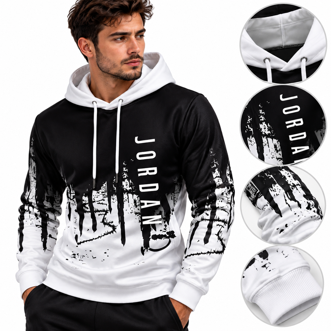 Black and white graphic hoodie close-up with hood, drawstrings and print details