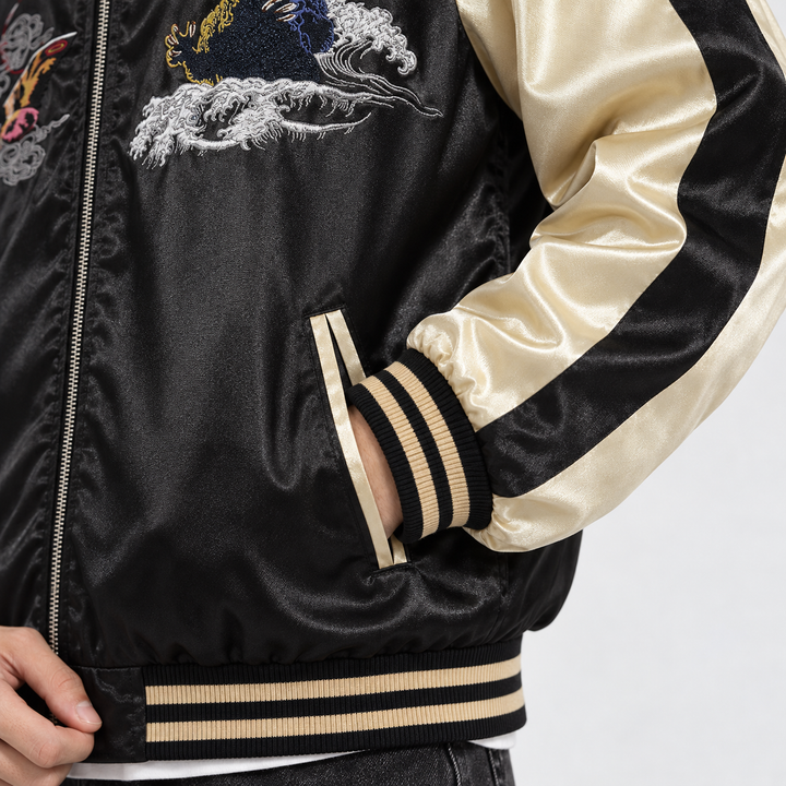 Close-up of side pocket, champagne sleeve and striped rib cuff on the men&