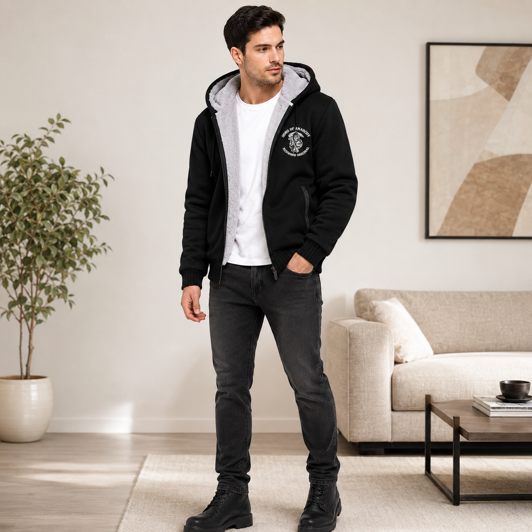 Black hooded fleece jacket on male model in a lifestyle image for a clear look at the product&