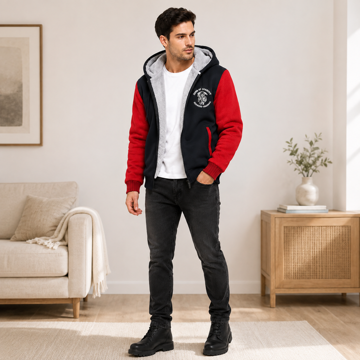Red and black hooded fleece jacket, on a male model in a lifestyle view for a clear look at the product&