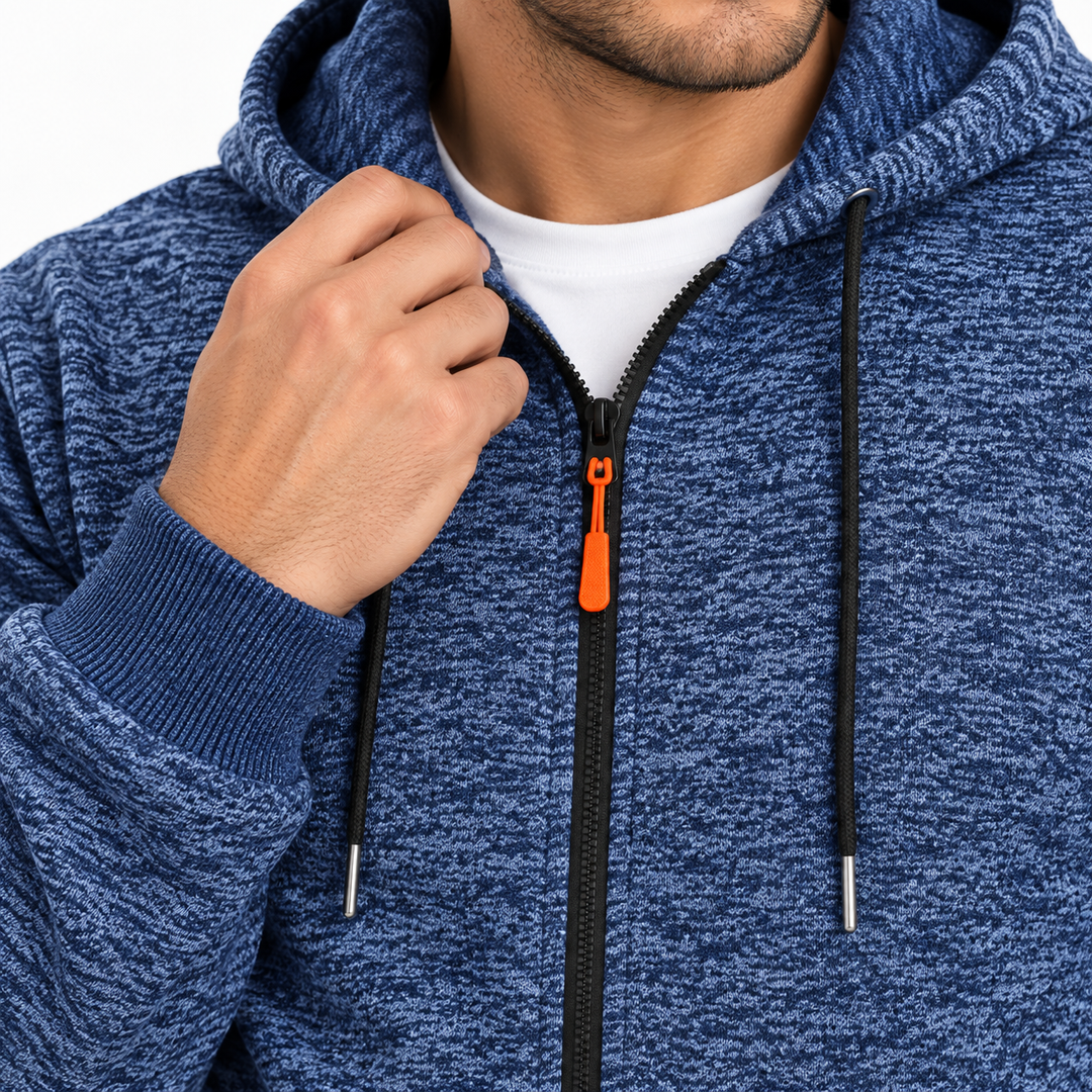 Close-up of Sapphire Blue fleece sweater showing marled texture, front zipper, orange pull, drawstrings and ribbed cuff view.