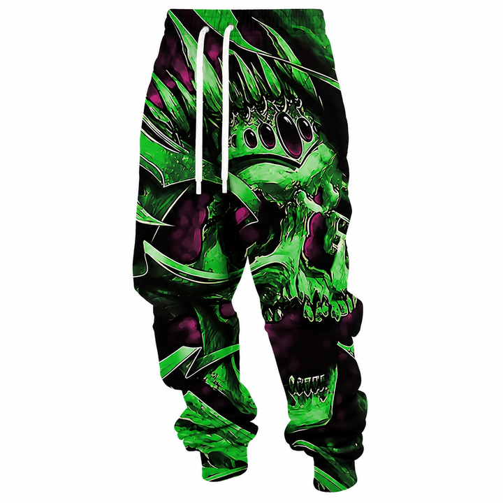 Green crown skull printed joggers on a white background, showing the white drawstring waist, front artwork and gathered cuffs