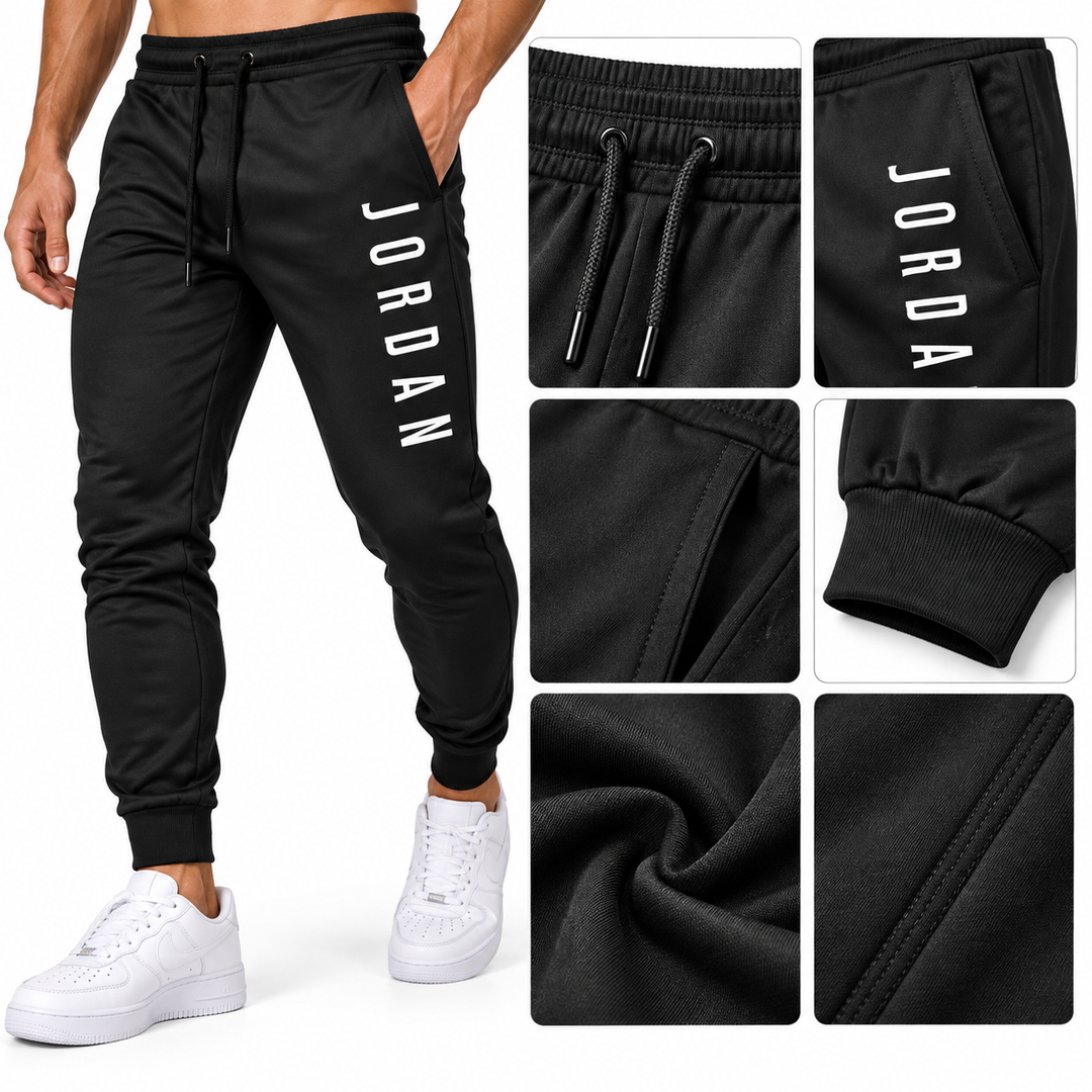 Black jogger pants detail with waistband, pocket, cuff and graphic text