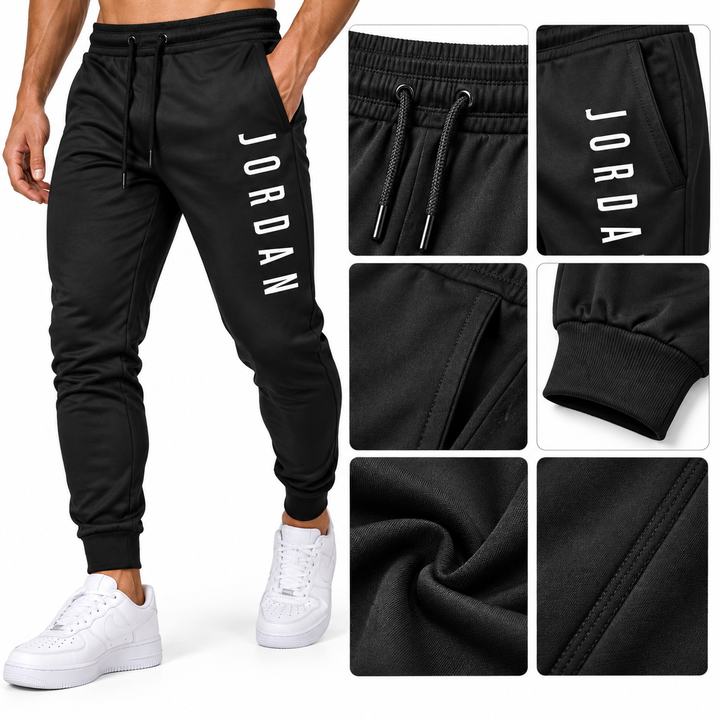 Black jogger pants detail with waistband, pocket, cuff and graphic text