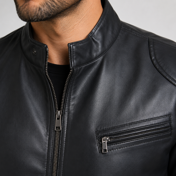 Close-up of black stand collar motorcycle leather jacket collar zipper and chest pocket