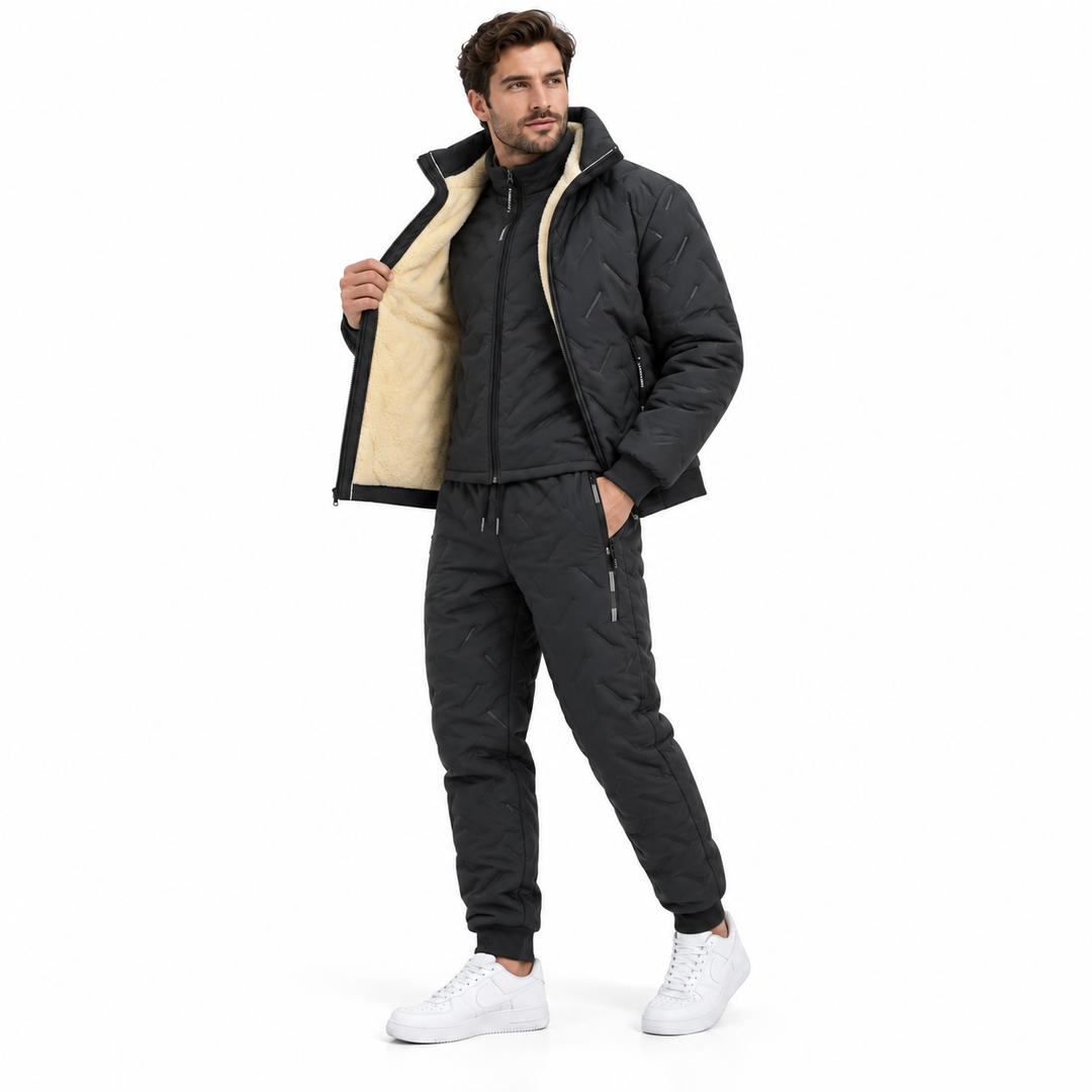 Black three-piece winter set on male model in side view with jacket lining visible