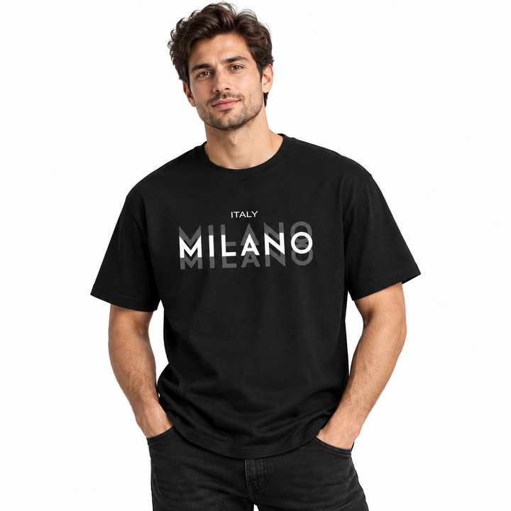 Male model wearing the black Milano cotton T-shirt on a white studio background.