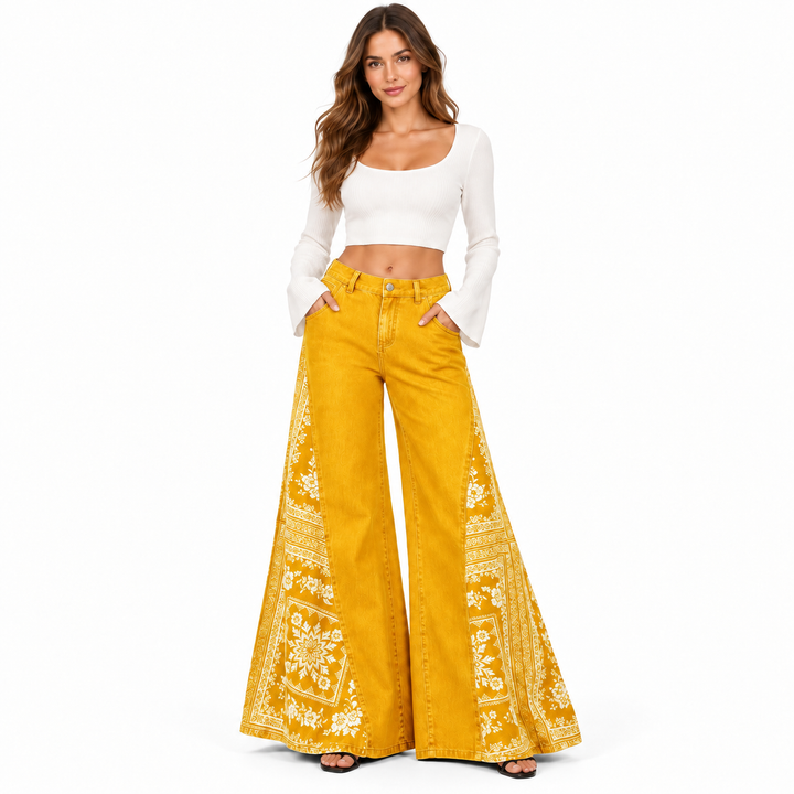 Mustard yellow wide leg pants in a full-body studio view with white printed side panels
