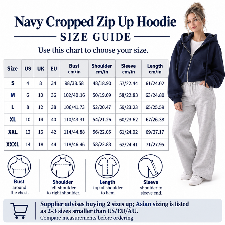 Photograph of navy cropped zip up hoodie supplier size guide, showing the garment design, on a clean white studio background.
