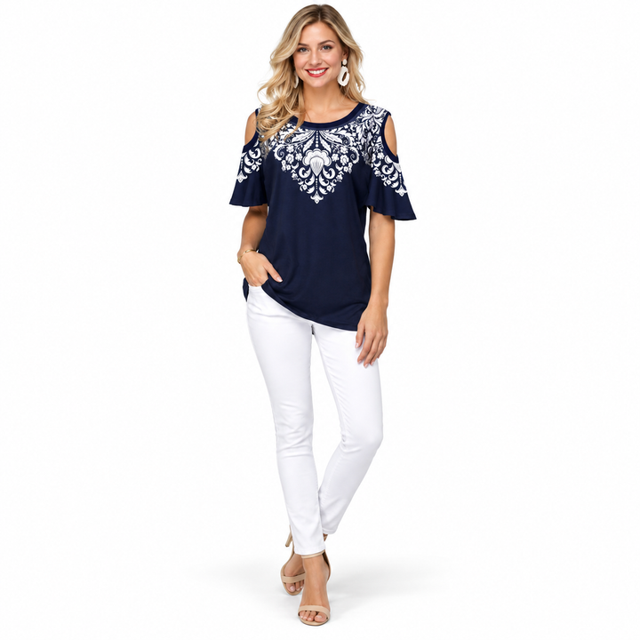 Navy and white off shoulder printed top on a full-length model