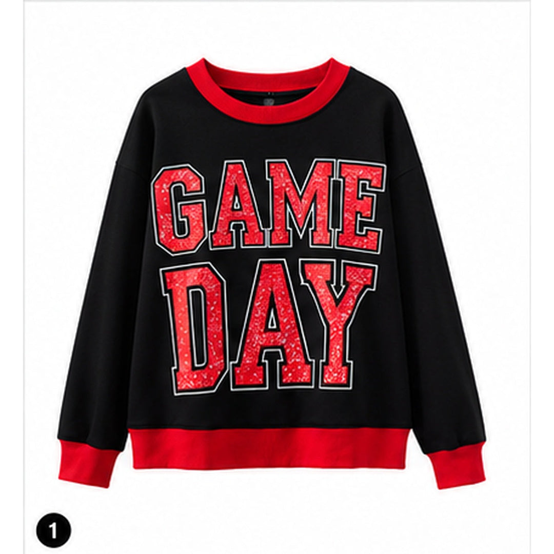 Oversized game day sweatshirt in black with red ribbed trim and distressed GAME DAY varsity graphic on a clean white background.