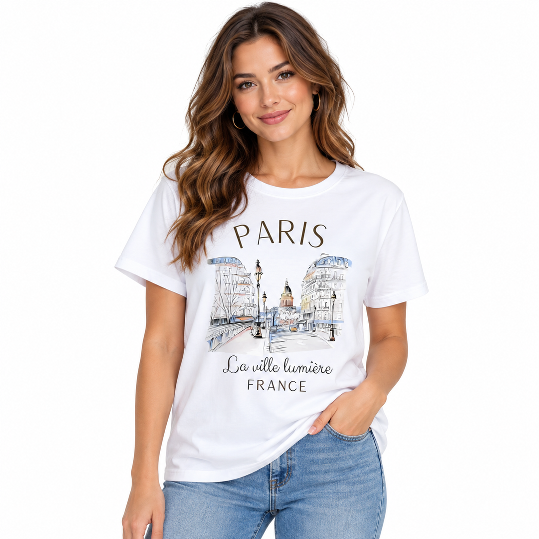 Paris graphic T-shirt for women shown on model in white with crew neck short sleeves and illustrated France city print detail