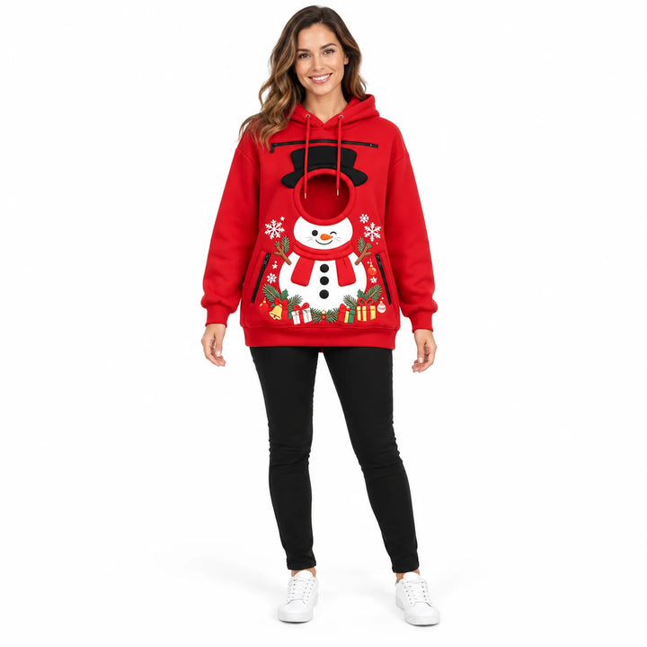Full-body model wearing a red snowman pet pouch hoodie with long sleeves, circular front opening and Christmas gift graphics.