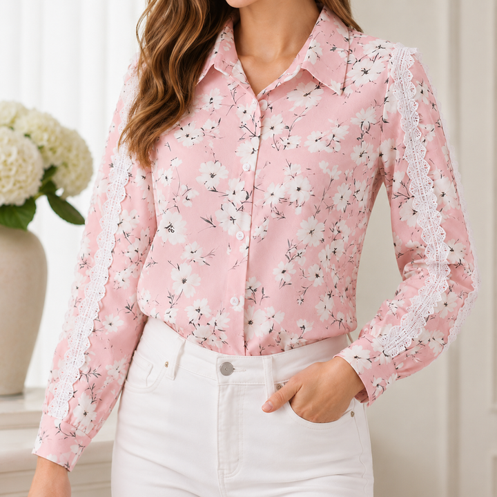 Hero view of pink floral blouse highlighting flower print, button front, collar, long sleeves and white lace trim detail shot
