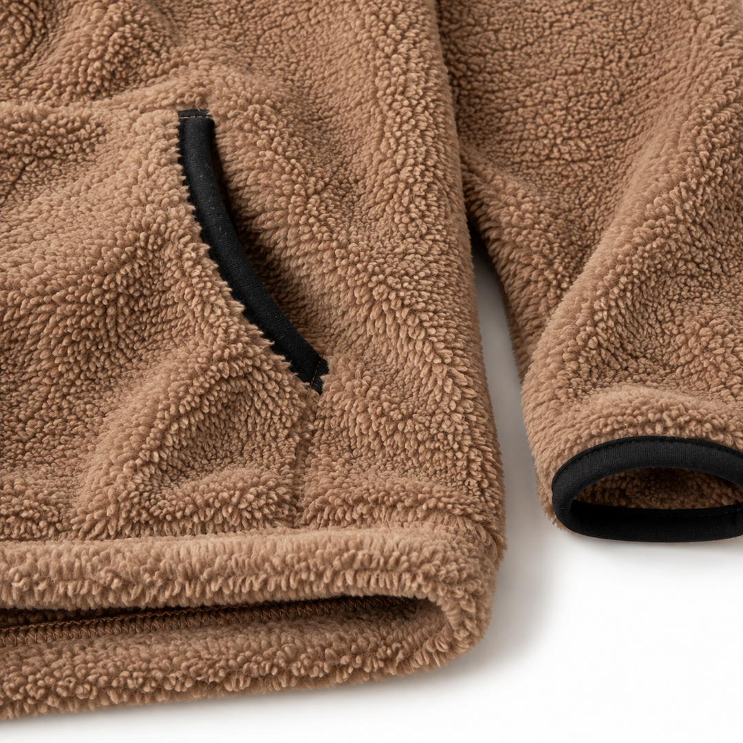 Plus-Size Fleece Quarter-Zip Sweatshirt brown close-up showing fleece texture, pocket trim, and seams.