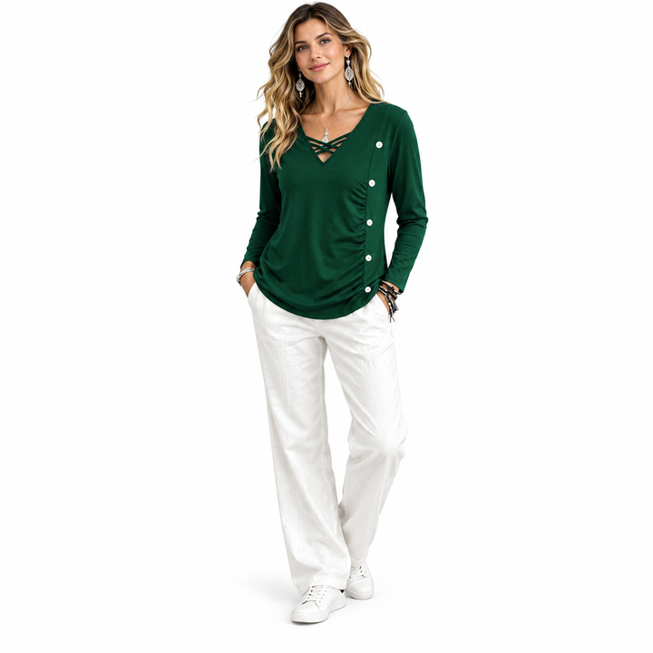 Dark green top shown in a three-quarter standing pose