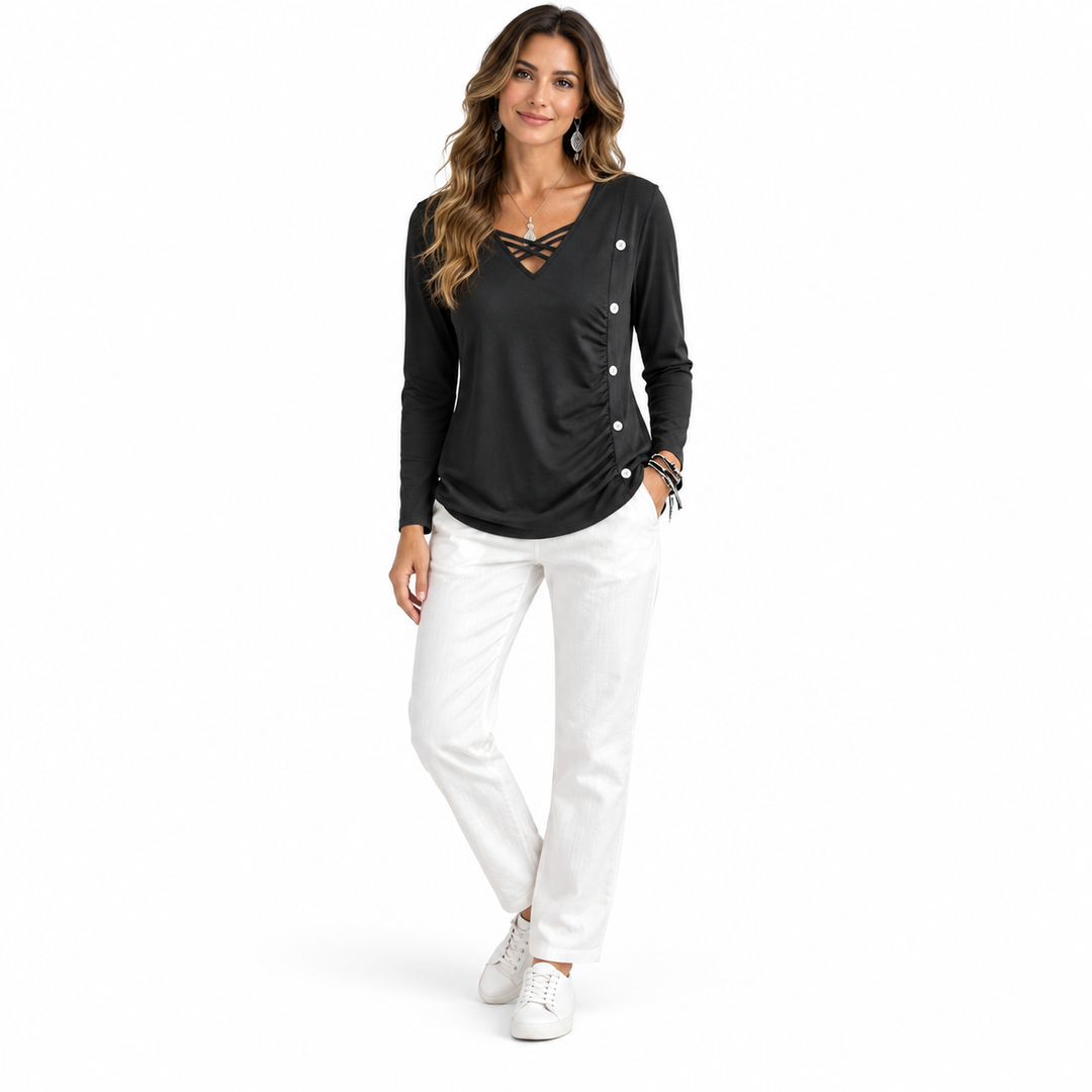 Dark gray top styled with white trousers