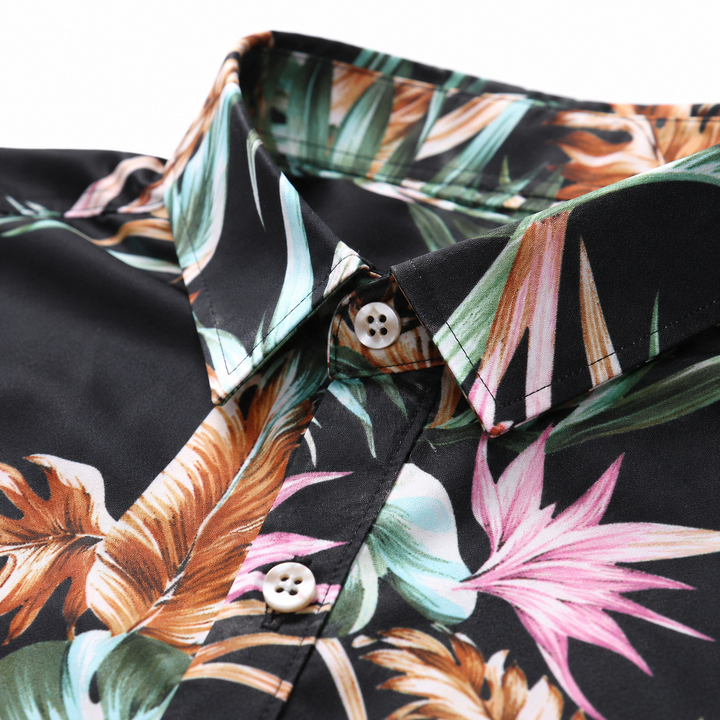 Close-up of a black tropical print men&
