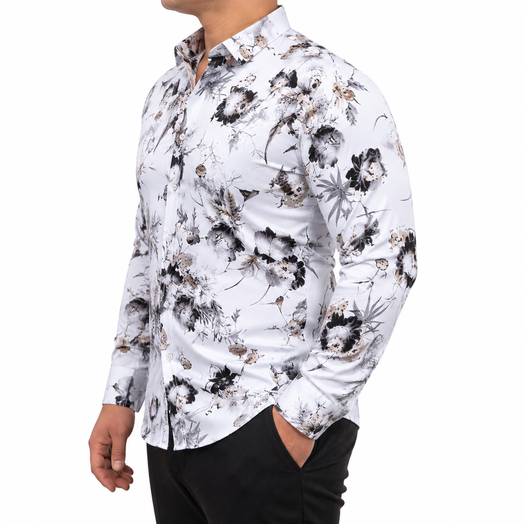 Plus-size male model wearing a white monochrome floral long-sleeve button-up shirt in a side fit view on white.