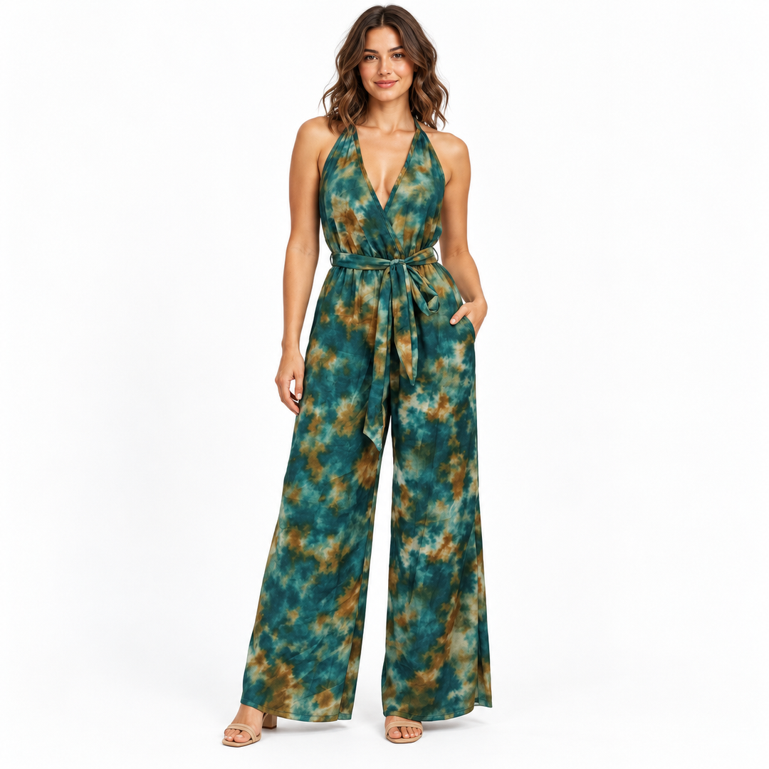 Plus size tie dye jumpsuit in Dark Green with halter neckline and tied waist, full-length model view