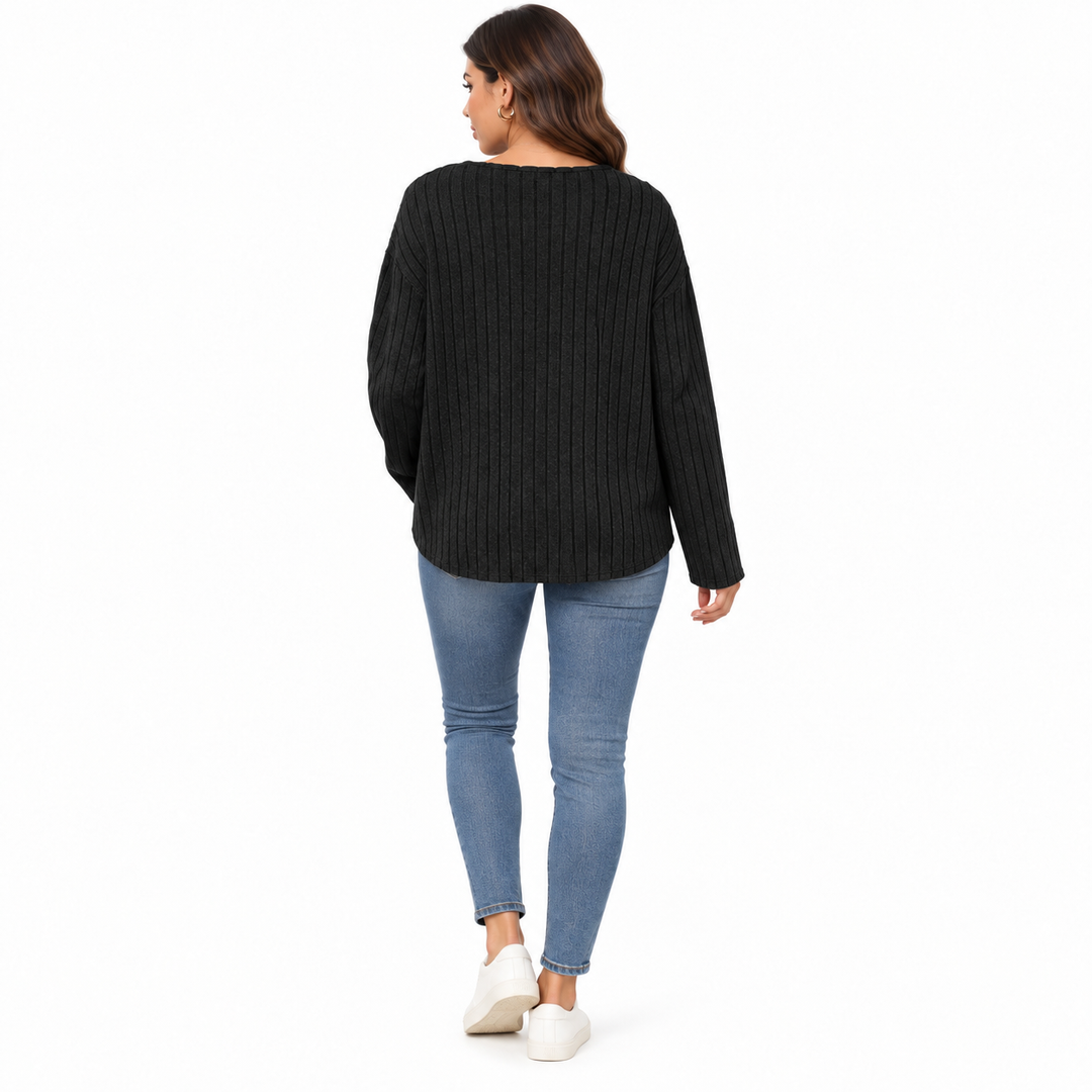 Black long sleeve ribbed knit sweater shown from the back