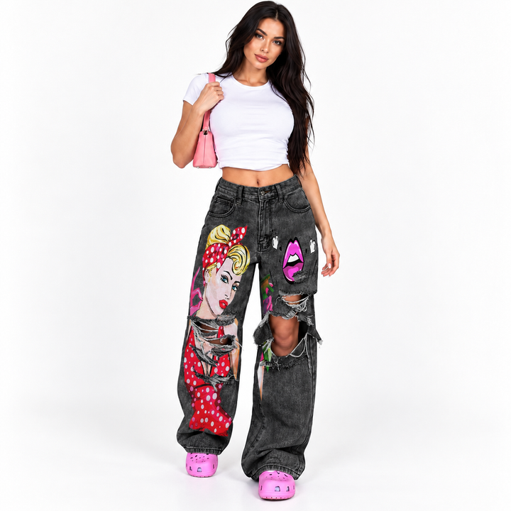 Black gray distressed wide leg jeans with colorful illustrated art print, front pockets and visible washed denim finish.
