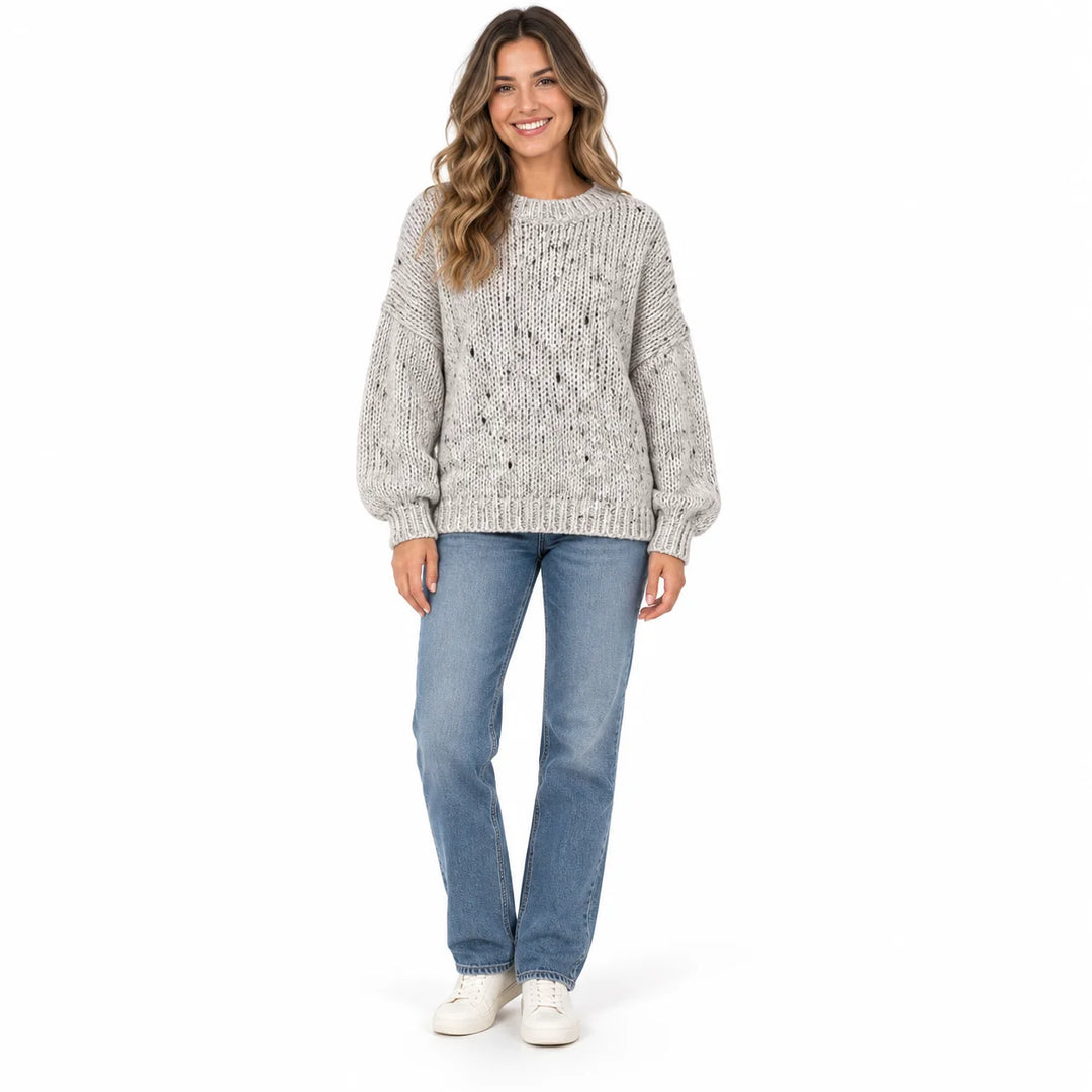 Light Gray textured knit pullover on a full-length female model showing a round neckline, dropped shoulders and ribbed cuffs.