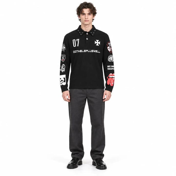 Graphic polo shirt in black on one full-length male model, showing the studded collar, white cross and red lips sleeve print.