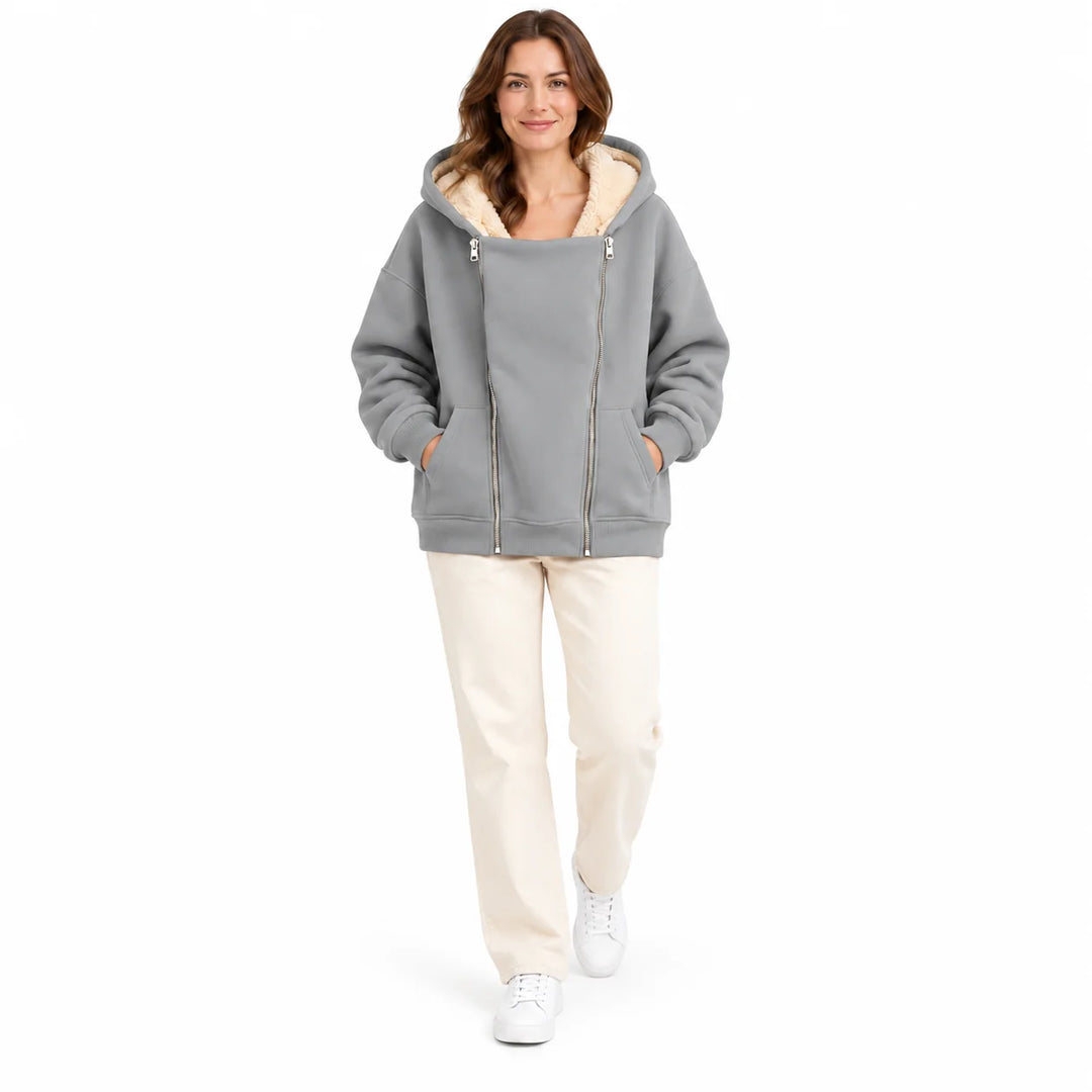 Light Gray hooded sweatshirt on a full-body adult model in a relaxed studio pose, with twin zippers and angled front pockets.
