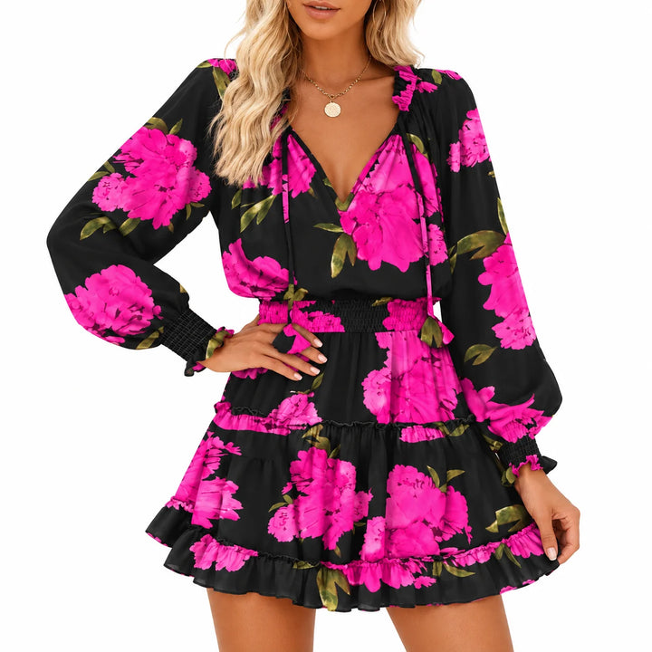 Black Pink Floral mini dress close-up showing long V-neck ties, long sleeve cuffs, smocked waistband and tiered ruffle skirt.