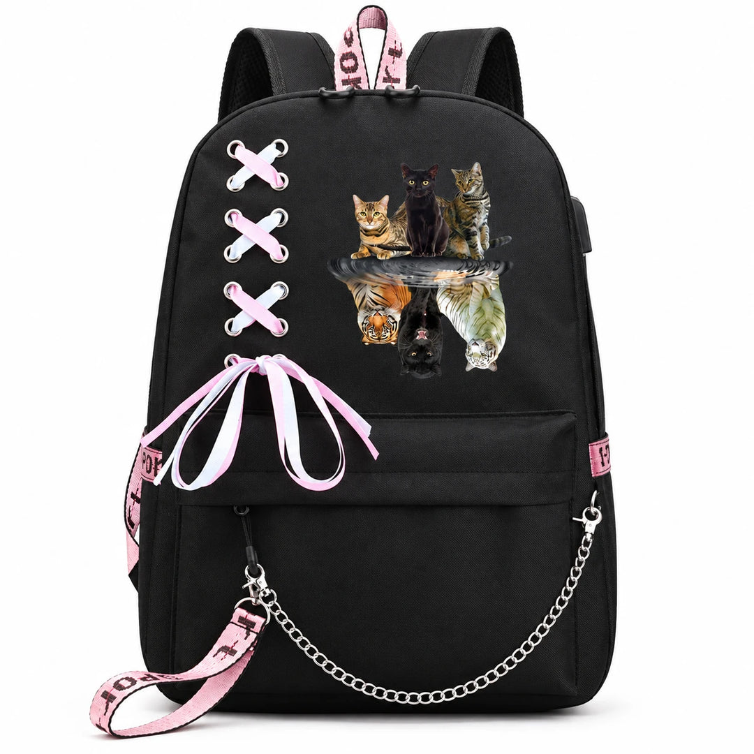 Black bag with three cats and big-cat reflections printed on the front, with pink ribbon lacing, bow and draped silver chain.