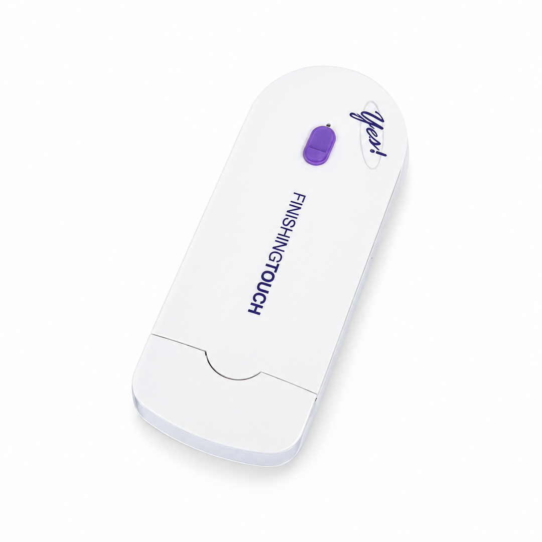 White and purple capped grooming device shown at a diagonal angle