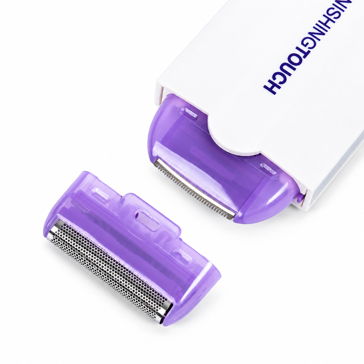 Purple trimmer head fitted to a white device with a separate foil head beside it